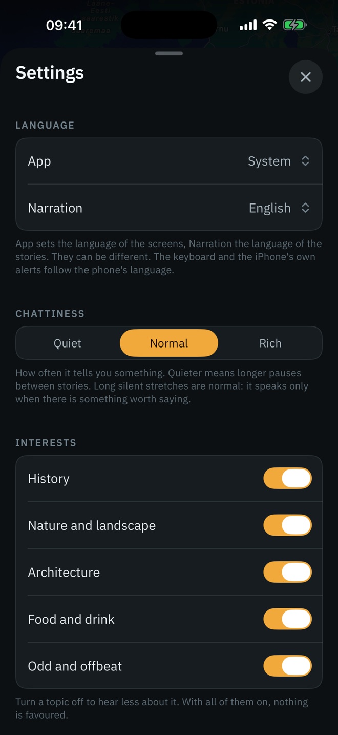 Settings: app and narration languages, chattiness set to Normal, and interest toggles for history, nature, architecture, food, and odd and offbeat stories.